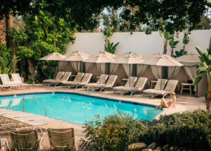 Woman in swimsuit enjoying the pool at Glen Ivy Hot Springs