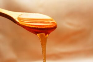 Highlighting the health benefits of honey when consumed and used topically for National Honey Month.