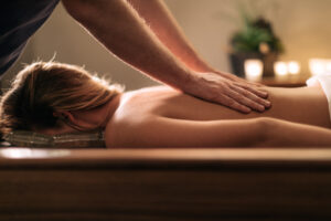 Woman receiving massage from massage therapist at Glen Ivy Hot Springs