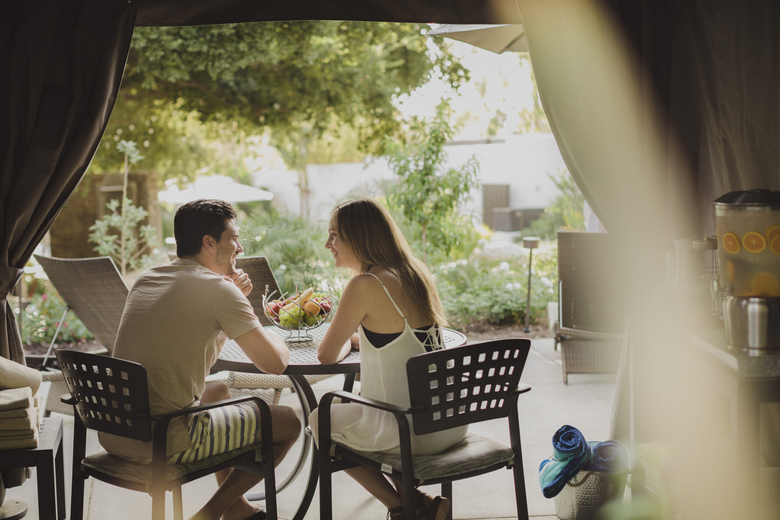 Couple enjoying Glen Ivy Hot Springs cabana as a romantic retreat.