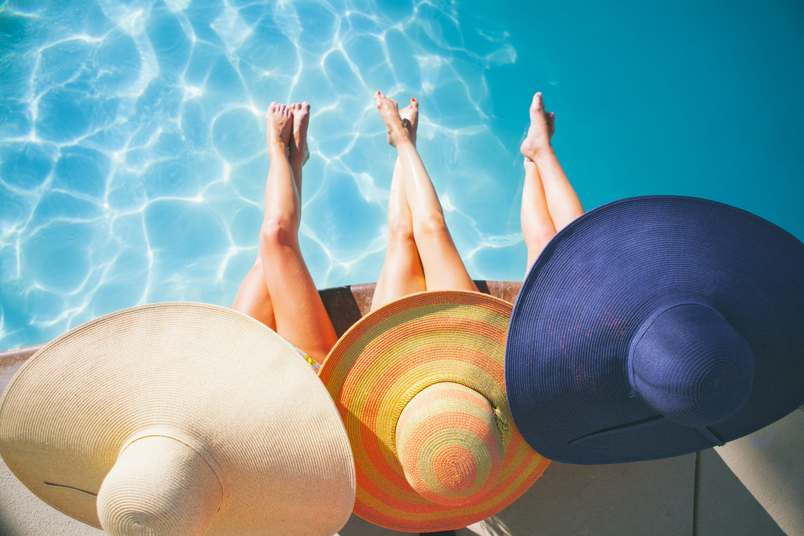 Three women discussing effective tips about how to exfoliate and exploring refreshing treatments with Glen Ivy Hot Springs.