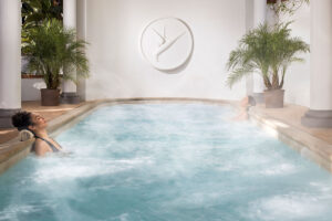 Two women soak in hydrothermal therapy pools at Glen Ivy Hot Springs.